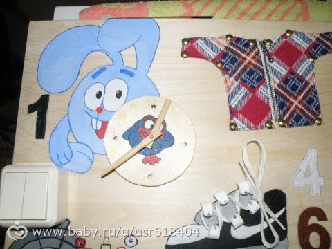 Бизиборд - доска с замочками.